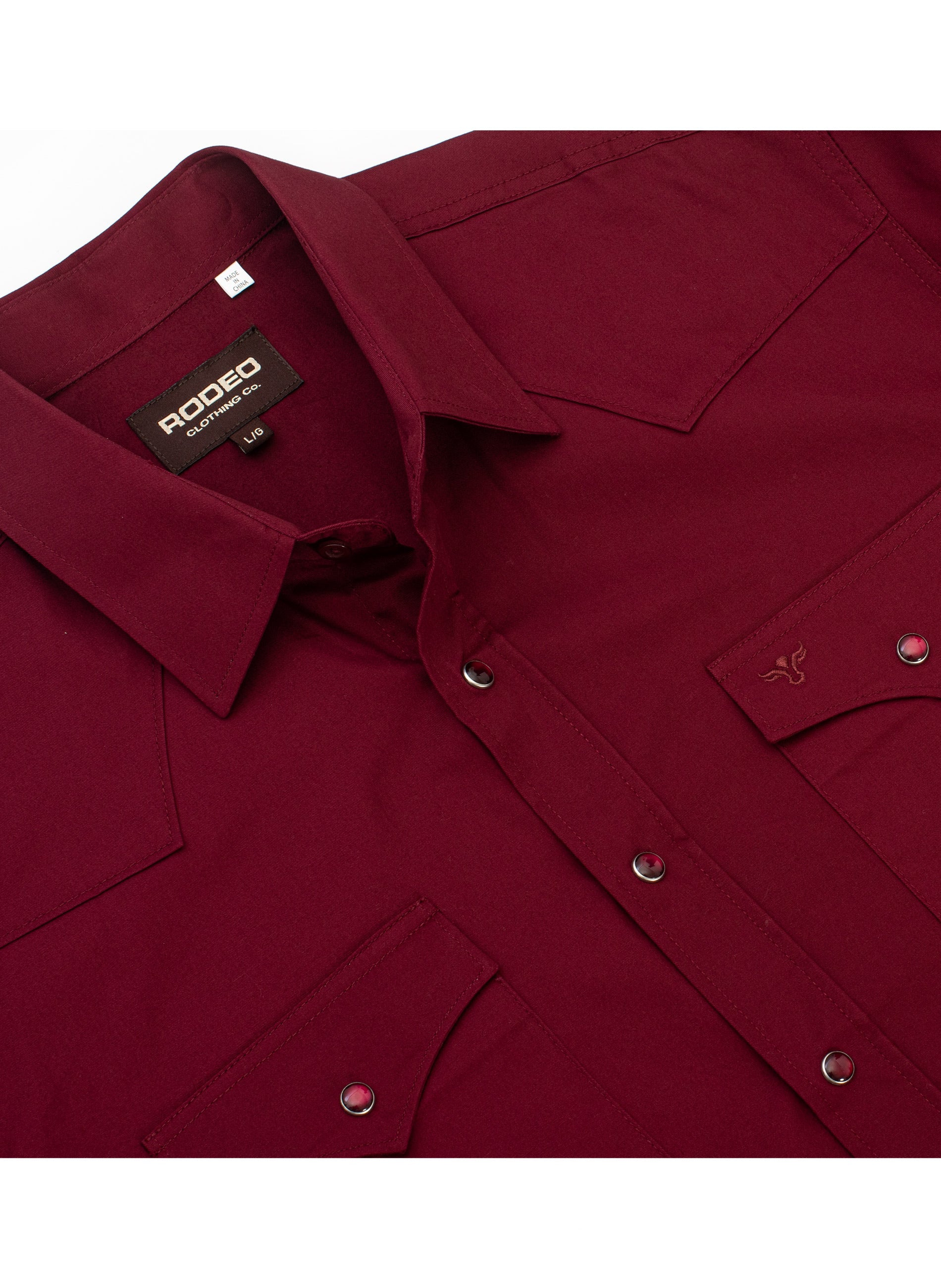 Burgundy shirt with 'Rodeo' label on a white background