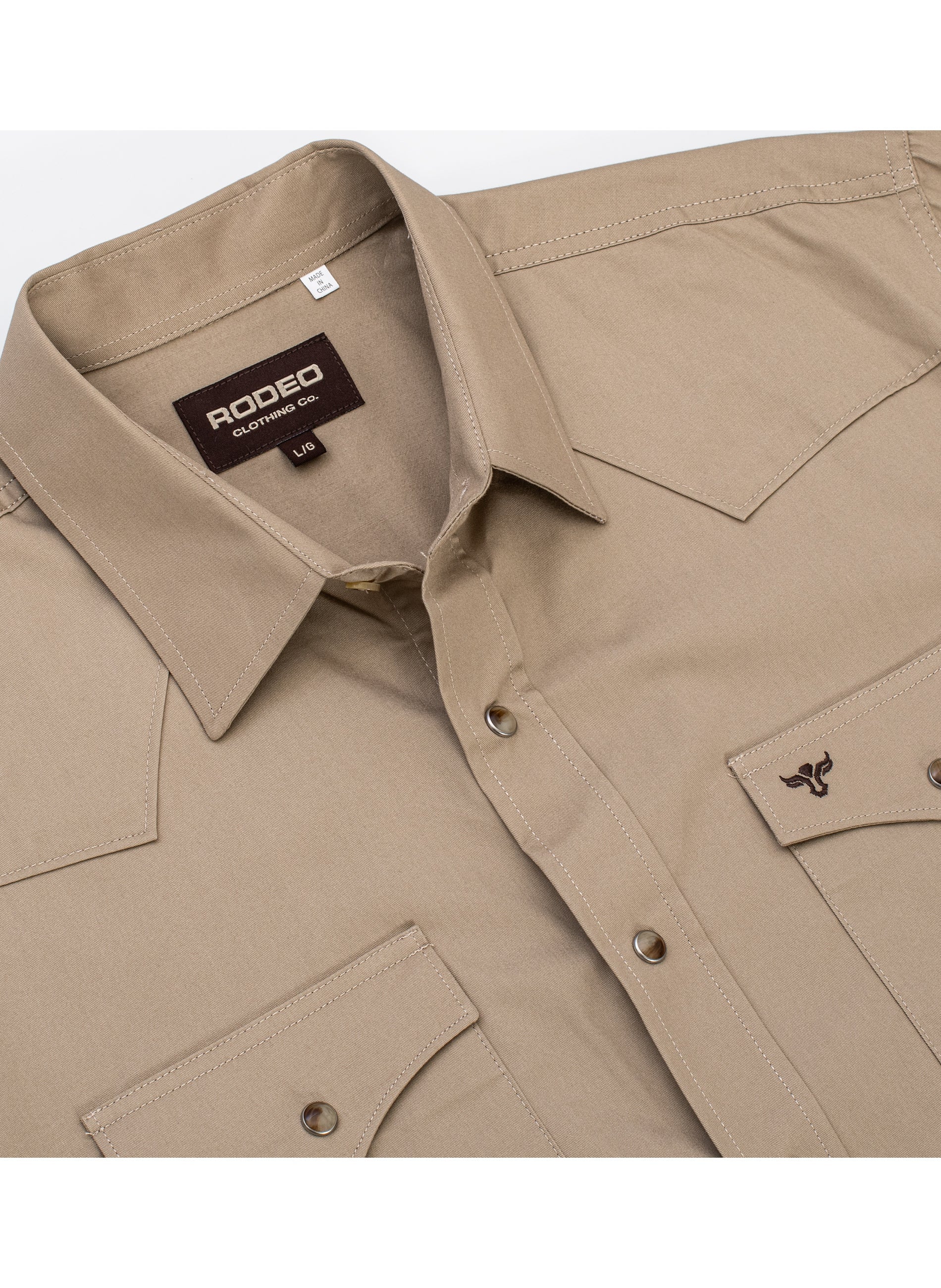 Khaki shirt with Rodeo label on a white background